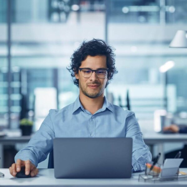 A Professional IT Expert Working on a Computer