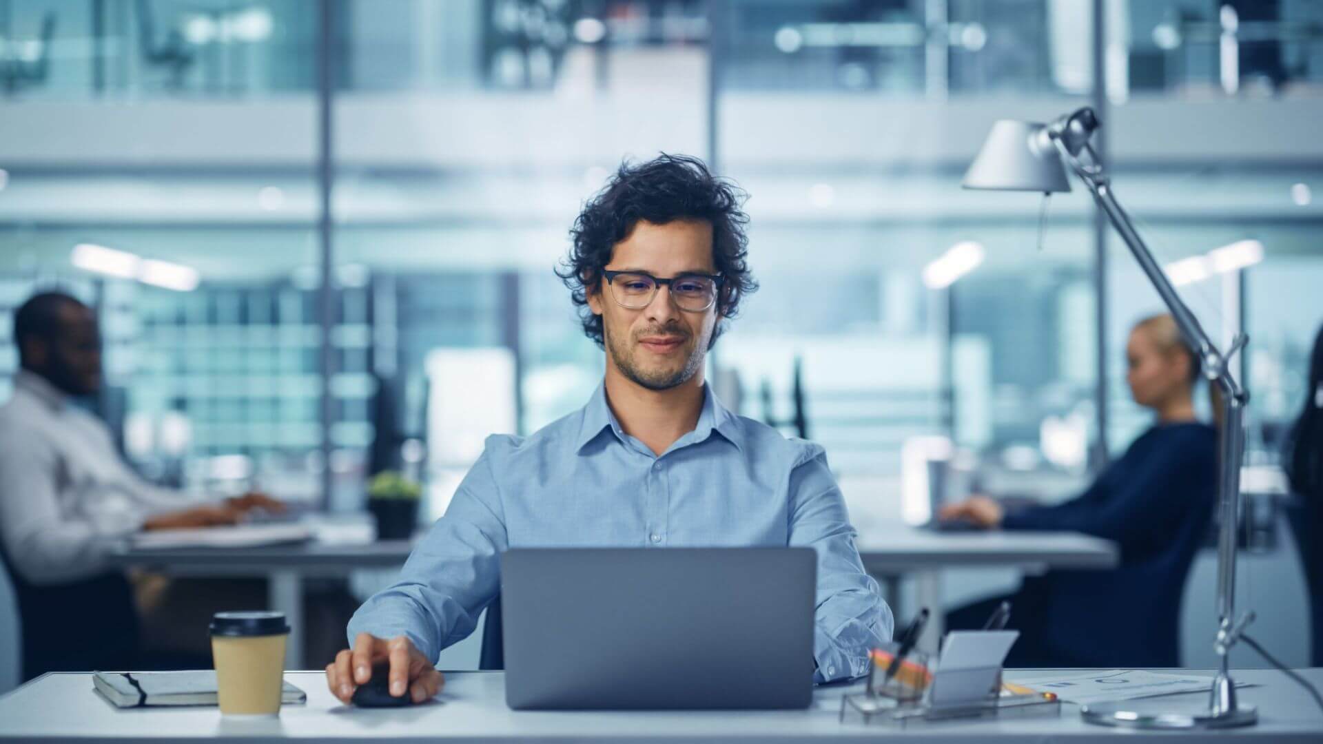 A Professional IT Expert Working on a Computer